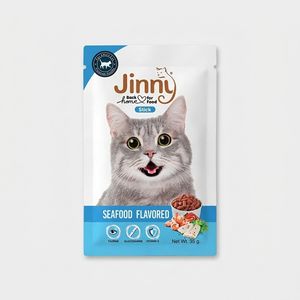 غذای تشویقی گربه جینی مدل seafood flavored وزن 35گرم